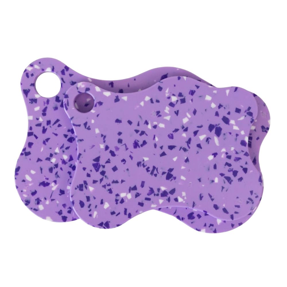 Nibble & Rest Plum Mama and Mini chopping board set stacked together, featuring a violet and blue speckled design with hanging holes.