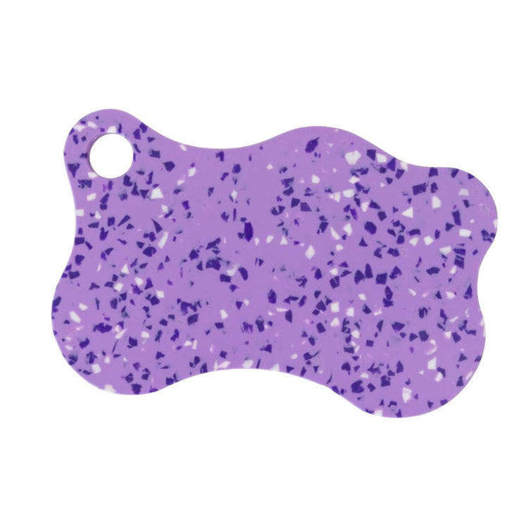 Nibble and Rest Plum Mama Chopping Board featuring a vibrant violet and blue speckled design with a hanging hole.